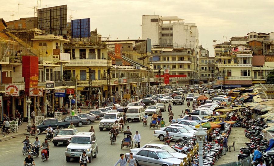 Busy street outside Psar Thmei Market in Phnom Penh