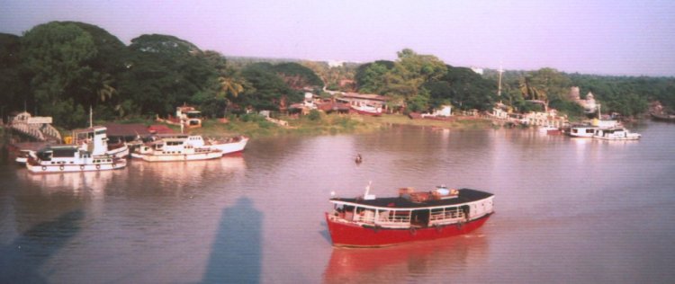 Boats in Yangon River in Yangon ( Rangoon ) in Myanmar ( Burma )