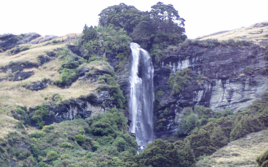 Waterfall in Matukituki Valley in the South Island of New Zealand